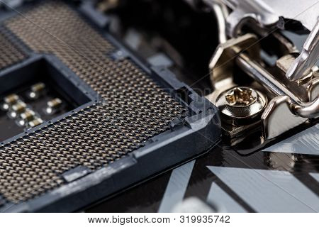 Opened Central Processor Lga Slot On Pc Mainboard - Closeup Shot With Selective Focus And Blur
