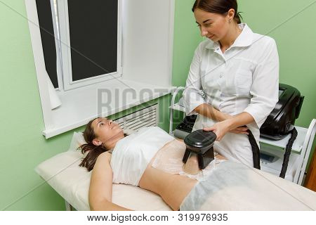 Cryolipolysis Fat Freezing Treatment. Weight Loss And Slimming Procedure In Beauty Salon