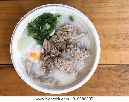 Traditional Thai Porridge Rice Gruel In White Bowl Congee With Many Topping