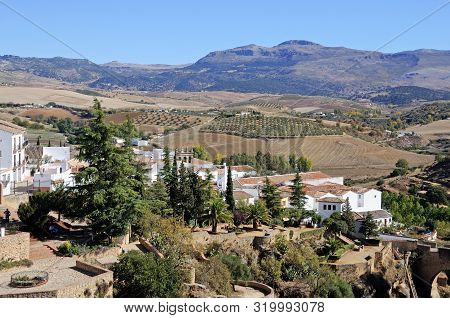 Ronda, Spain - October 24, 2009 - View Over The Edge Of The Old Town And Surrounding Countryside Wit
