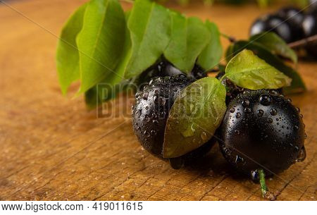 Jabuticaba, Jabuticabas In Detail On Rustic Wood, Selective Focus.