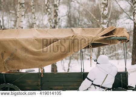 Hidden Re-enactor Dressed As German Wehrmacht Infantry Soldier In World War Ii Sitting In Ambush Nea