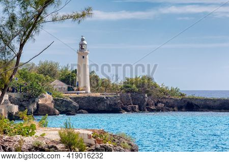 Lighthouse At Sunset In Caribbean Island, Negril, Jamaica Island