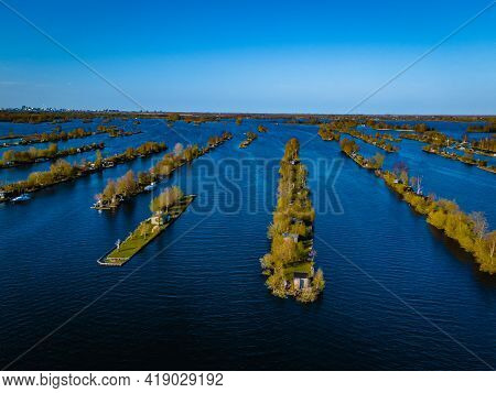 Aerial View Of Small Islands In The Lake Vinkeveense Plassen, Near Vinkeveen, Holland. It Is A Beaut