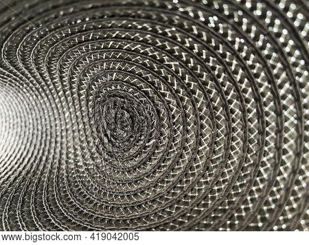Grey Colour Background From Circular Wicker Pattern Texture.