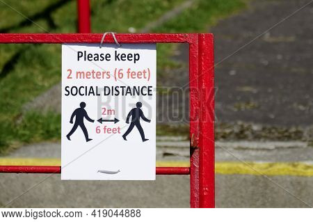 Social Distancing Sign At School Playground Road Crossing