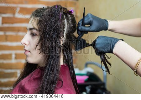 The Process Of Straightening Curly Hair With Keratin. Keratin Hair Straightening.