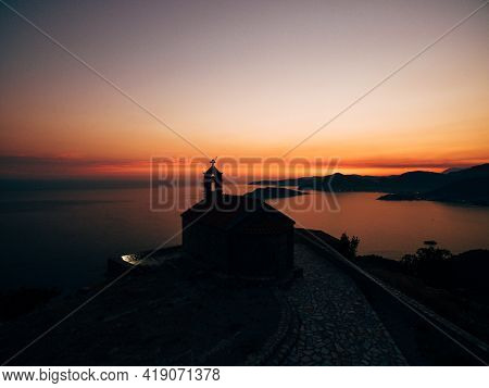 Church Sveti Savva Near Island Sveti Stefan At The Sunrise Time.