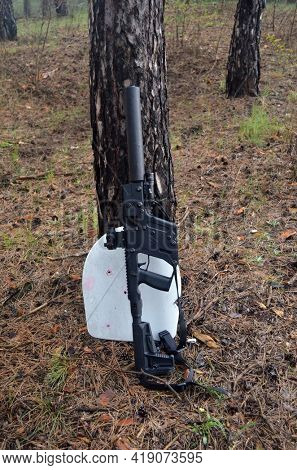 KRISS Vector 9*21 caliber submachine gun in theforest. Unformal shooting range near Kiev.April 30,2021. Kiev Region, Ukraine