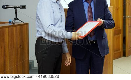 Men In Business Suits - Politicians, Businessmen, Teachers Or Lawyers - Are Participants In The Awar