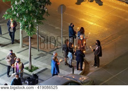 Thessaloniki, Greece - May 01 2021: Orthodox Easter 2021 Anastasi Resurrection. Faithful Wearing Fac