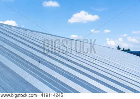 Roofs Metal Sheet Cloud Blue Sky Background, Concept Construction Roof.