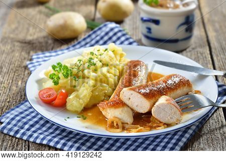 Fried Bavarian Sausages, So-called Wollwurst, A Specialty Similar To The German Veal Sausage But Wit