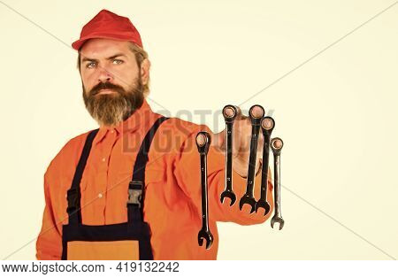 In Repairing Cars Main Role Is To Diagnose Problem Accurately And Quickly. Man Hold Wrench Tools. Wr