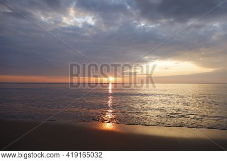 Beautiful Sunset Over The Clam Sea With Cloud Sky Background. Sunset Over Tropical Beach. Nature Sum