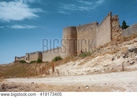 Medieval Wall In Sunburnt Fields. Valladolid, Spain