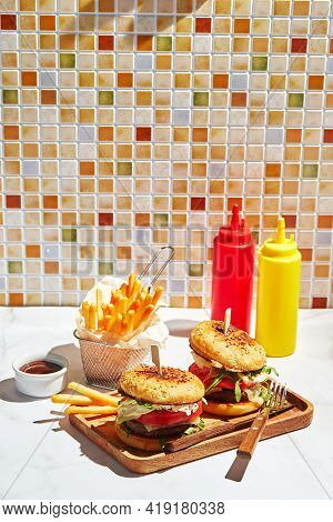 Delicious Homemade Burgers On Wooden Tray In Bright Sunlight. Burgers With Veal Cutlet, Pamidor, Che