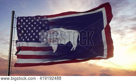 Wyoming And Usa Flag On Flagpole. Usa And Wyoming Mixed Flag Waving In Wind. 3d Rendering