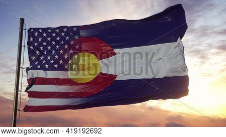 Colorado And Usa Flag On Flagpole. Usa And Colorado Mixed Flag Waving In Wind. 3d Rendering