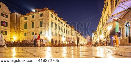 Dubrovnik, Croatia - Jine 12, 2017: Panoramic view of Stradun street in the Old Town of Dubrovnik at night