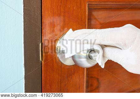 Prevention Cleaning Door Handles By Disinfectant Solution For Killing Corona Virus On Touching Surfa