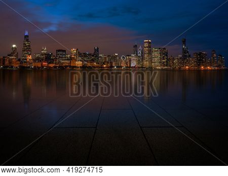 Automotive And Parking Lot Concept, Road Of Parking Over Chicago Cityscape River Side At Evening Tim
