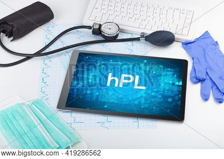 Close-up view of a tablet pc with medical abbreviation