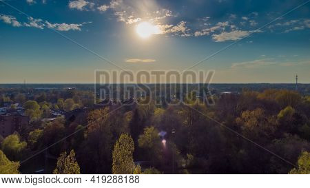 Drone: Aerial View Of A Golden Morning Sunshine During Sunrise Or Sunset Illuminates The Spectacular