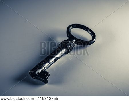 Grayscale Photo Of Golden Key Isolated On White Background. Old Rusty Door Key. Antique Gold Key. Me