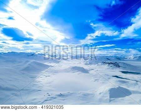 Spectacular Panoramic View Over Snowcapped Mountain Peaks.