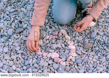 Garmony Meditation, Woman Hand Picking Up Set Zen Stones, Relaxed Hobby Rest