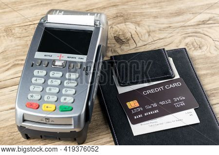 The Black Credit Card On Blank Bill Paper In  Leather Black Bill Receipt. Receipt Holder With Credit