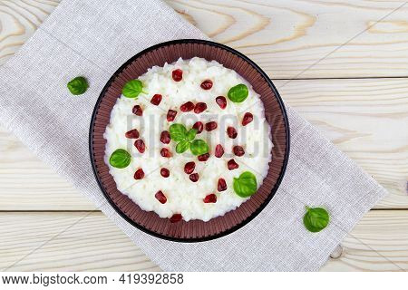 Curd Rice. A Popular Dish From South India With Rice, Yogurt, Spices And Pomegranate. Close-up, Top 