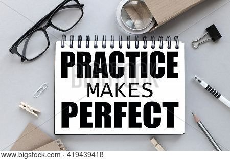 Notebook With The Text Practice Makes Perfect . Magnifier And Glasses Near Notepad