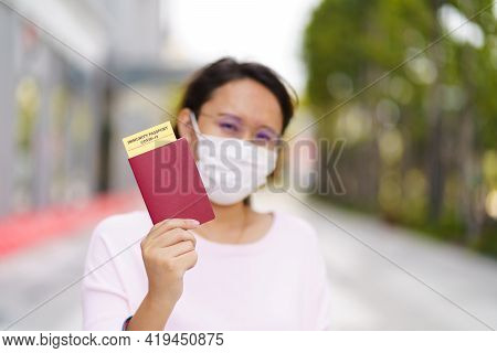 Passport With Vaccination Certificate For Covid-19 Person Record Card. Immune Passport Or Certificat
