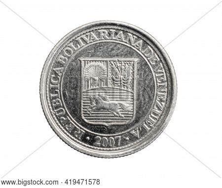 Venezuela Ten Centimos Coin On A White Isolated Background