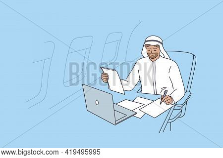 Private Plane And Luxury Life Concept. Young Smiling Businessman From United Arab Emirates Fsitting 