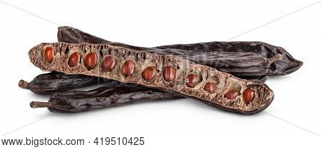Ripe Carob Pods And Bean Isolated On White Background With Clipping Path And Full Depth Of Field