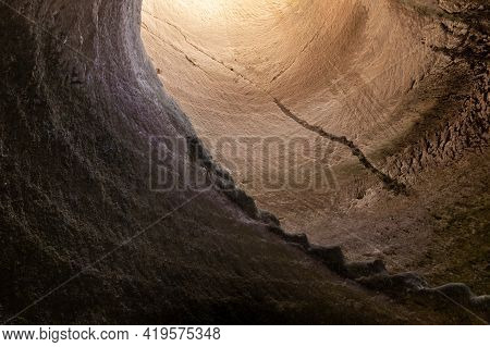 The Remains Of Stone Staircase Descends Into An Oil Press Tank On The Excavations Of The Ancient Mar