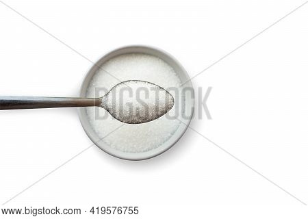 Top View Of The Sugar In Teaspoons That Are On A Separate Sugar Cup On A White Background Concept Of