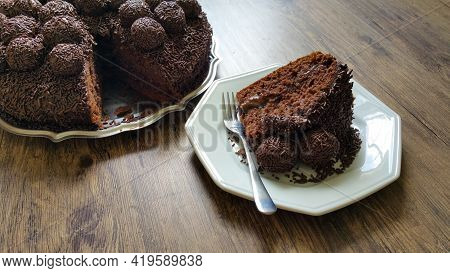 Brazilian Brigadier Cake With Cut Piece On The Plate.
