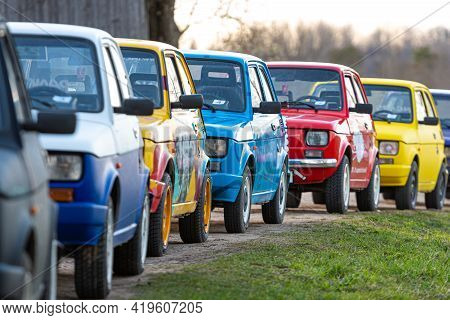 Madona, Latvia - May 01, 2021:  Row Of Colorful Stylish Vintage Fiat 126 Pancars Rental Cars, Pancar