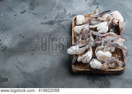 Fresh Raw Flower Crab Or Blue Crab Frozen Parts Set, On Wooden Tray, On Gray Background , With Copys