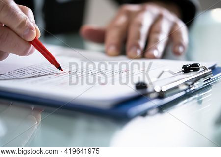 Editing Essay Content On Paper. Proofreader Marking Mistake