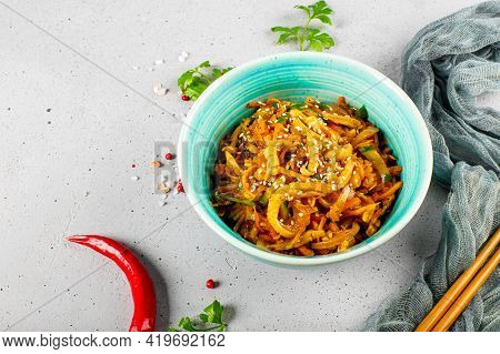 Traditional Asian Appetizer He Or Hwe, Squid Salad With Vegetables In A Bowl On The Table