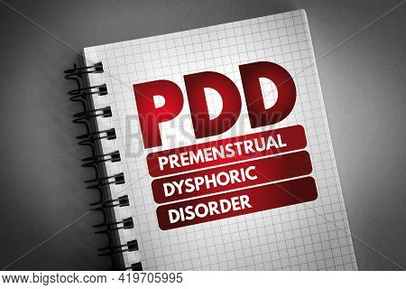 Pdd - Premenstrual Dysphoric Disorder Acronym On Notepad, Medical Concept Background
