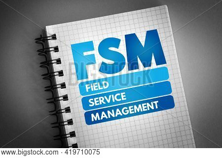 Fsm - Field Service Management Acronym On Notepad, Business Concept Background