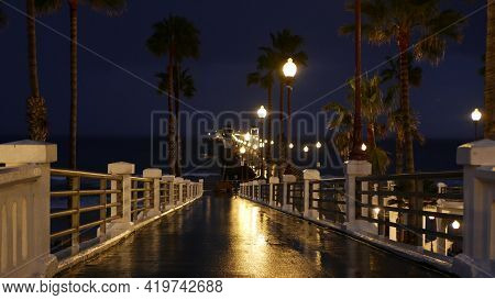 Rain Drops, Evening Dark Sky With Clouds, Oceanside California Usa. Empty Pier And Palm Trees In Twi