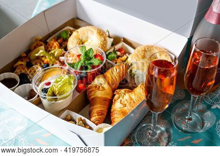 Breakfast In A Box To Go From Closed Restaurant Due Corona Virus Lockdown. Fresh Bagels, Croissants,