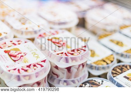 Ice Cream Products Put Up For Sale In A Commercial Refrigerator